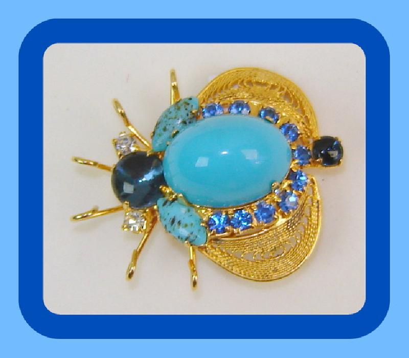 Front view of Turquoise Cabochons Brooch