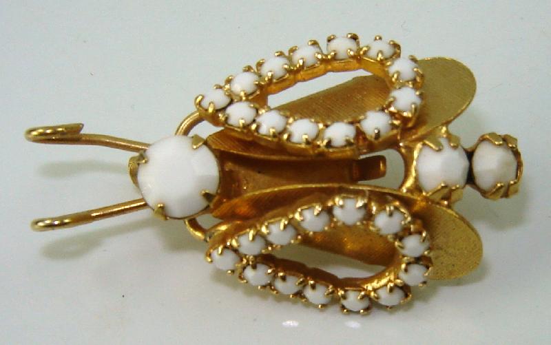 Front view of White (chalk Or Milk) Cabochons Brooch