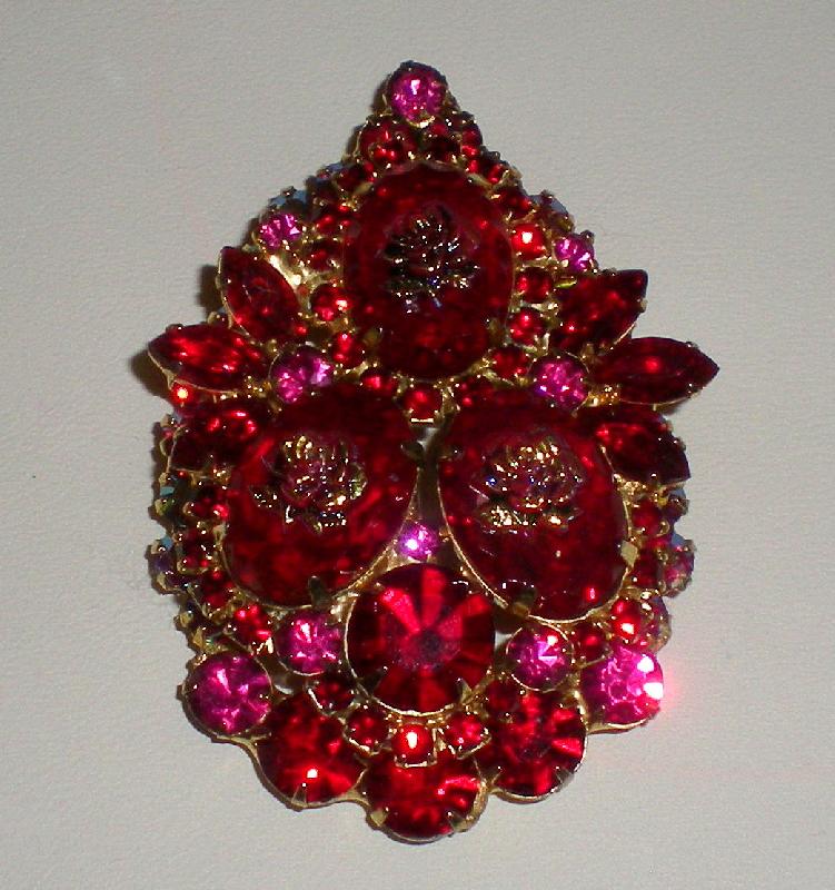 Front view of Red Oval Molded/Cut Pin Pendant