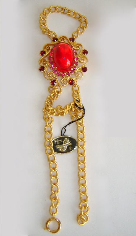 Front view of Red Cabochons Plastic Bracelet Slave