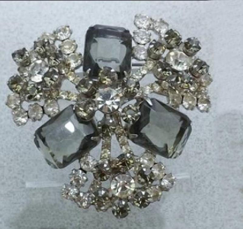 Front view of Gray (black Diamond) Emerald Cut Brooch