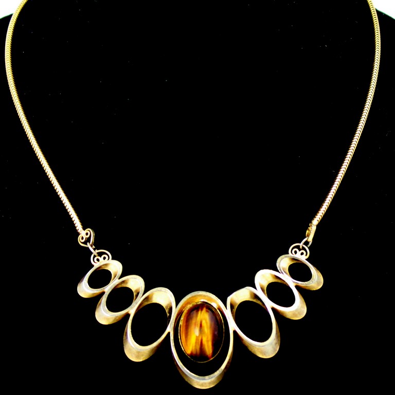 Front view of Topaz Cabochons Striped Necklace