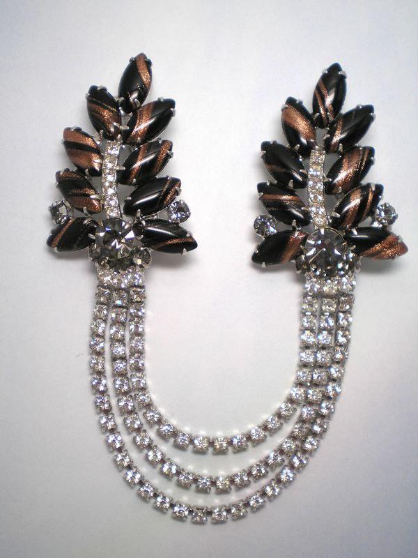 Front view of Black (jet) Navettes Striped Brooch
