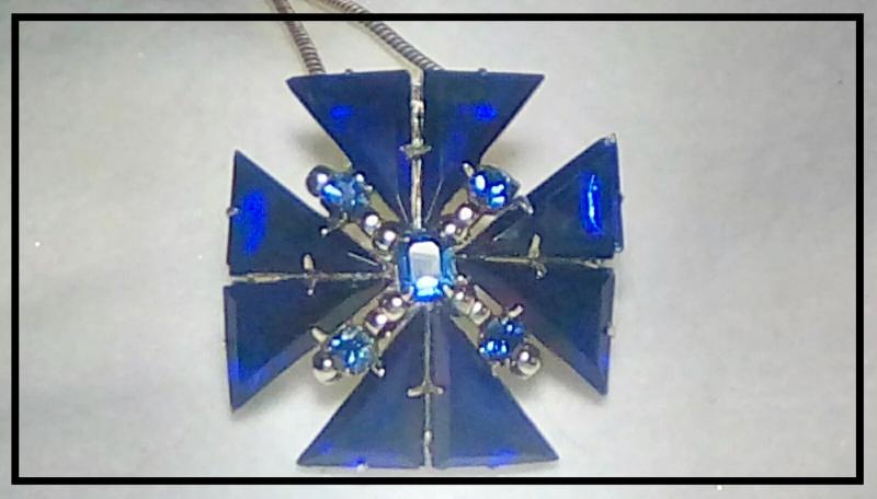 Front view of Blue Triangle Pin Pendant