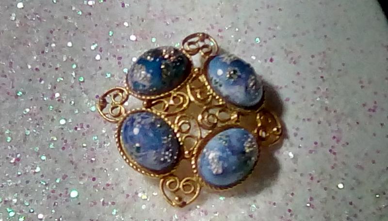 Front view of Blue Cabochons Painted (hand/Transfer) Brooch