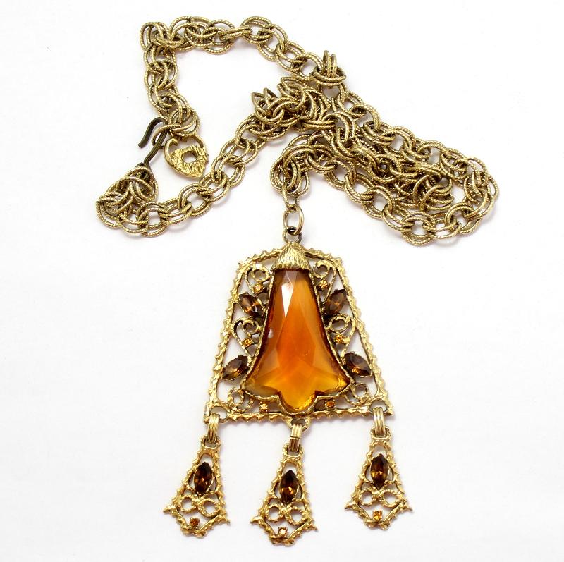 Front view of Topaz Cabochons Plastic Pendant
