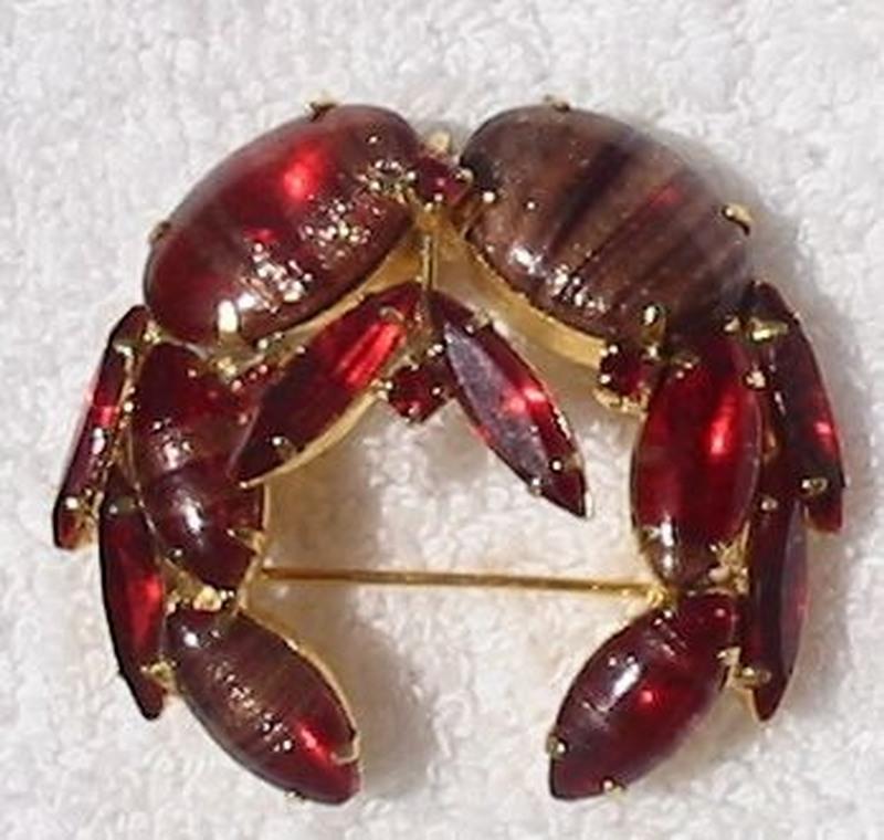 Front view of Red Cabochons Striped Brooch