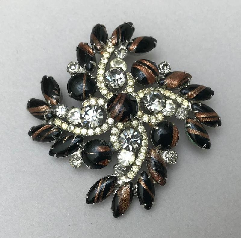 Front view of Black (jet) Cabochons Striped Brooch