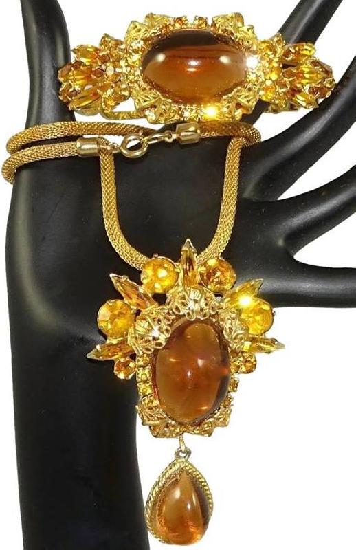 Front view of Topaz Cabochons Plastic Pin Pendant