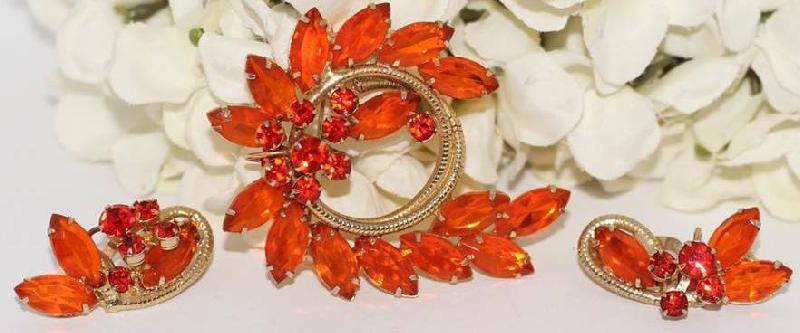 Front view of Orange Navettes Brooch