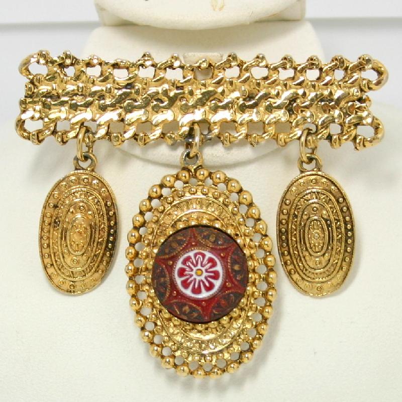 Front view of Red Cabochons Brooch