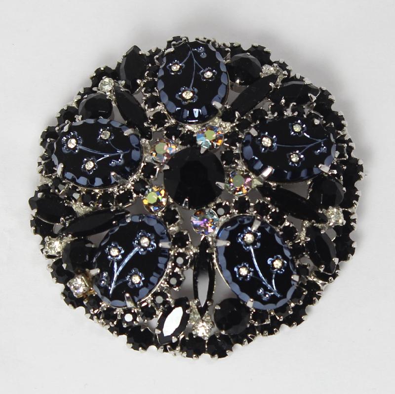 Front view of Black (jet) Oval Molded/Cut Brooch