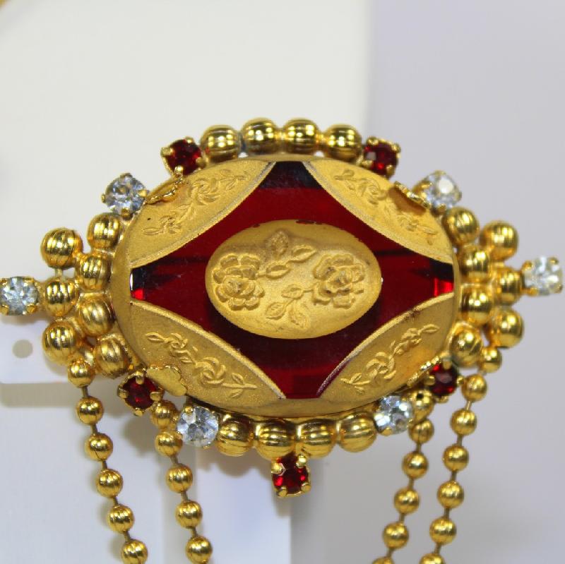 Front view of Red Oval Molded/Cut Brooch