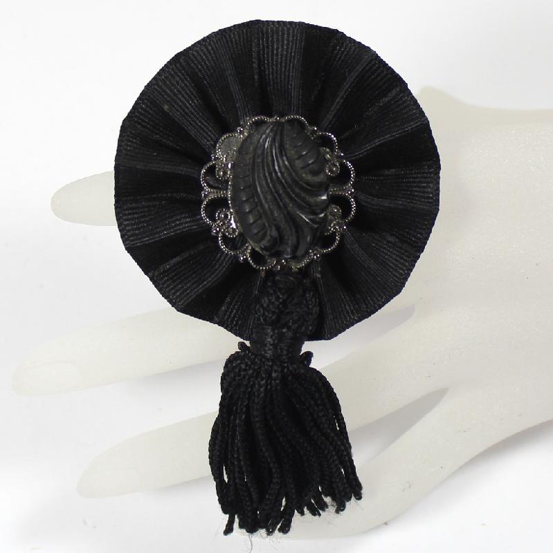 Front view of Black (jet) Cabochons Molded/Cut Brooch