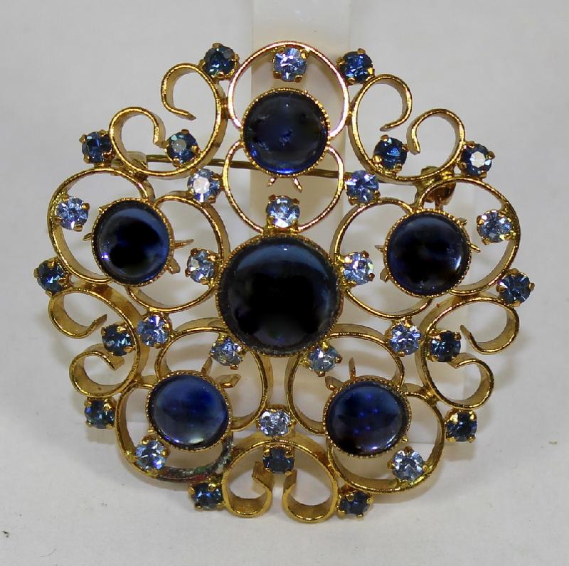 Front view of Blue Cabochons Brooch
