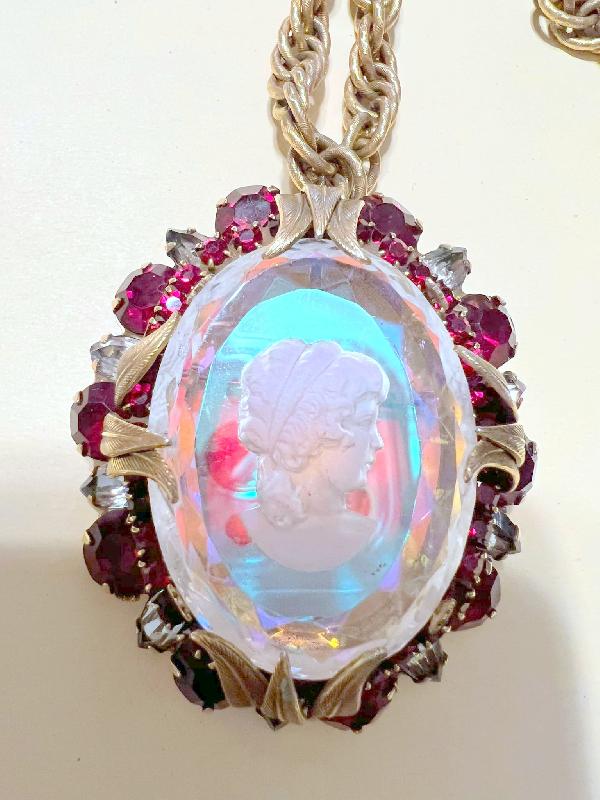 Front view of Red Oval Molded/Cut Pin Pendant