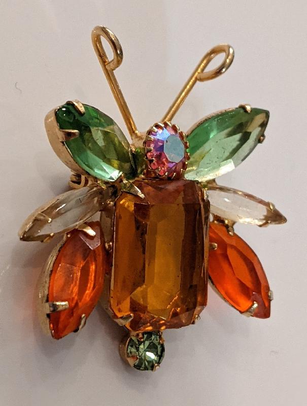 Front view of Fall Emerald Cut Brooch