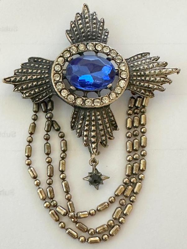 Front view of Blue Oval Brooch