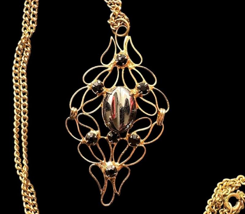 Front view of Hematite Scooped Pendant