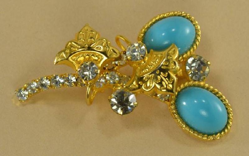 Front view of Turquoise Cabochons Brooch