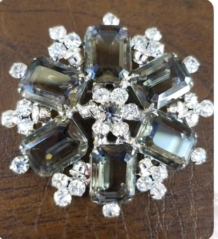 Front view of Gray (black Diamond) Emerald Cut Brooch