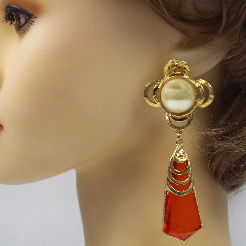 Front view of Orange Spear Plastic Earrings Clip