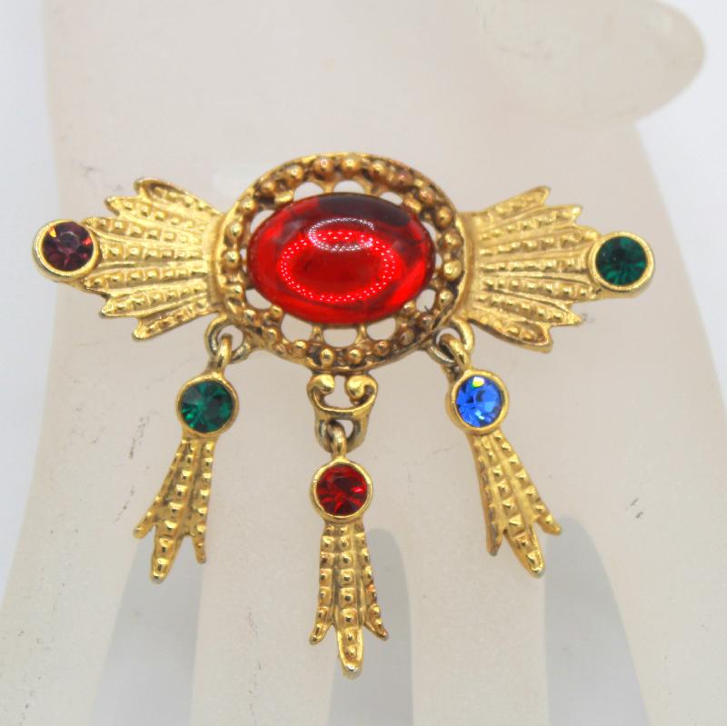 Front view of Red Cabochons Plastic Brooch