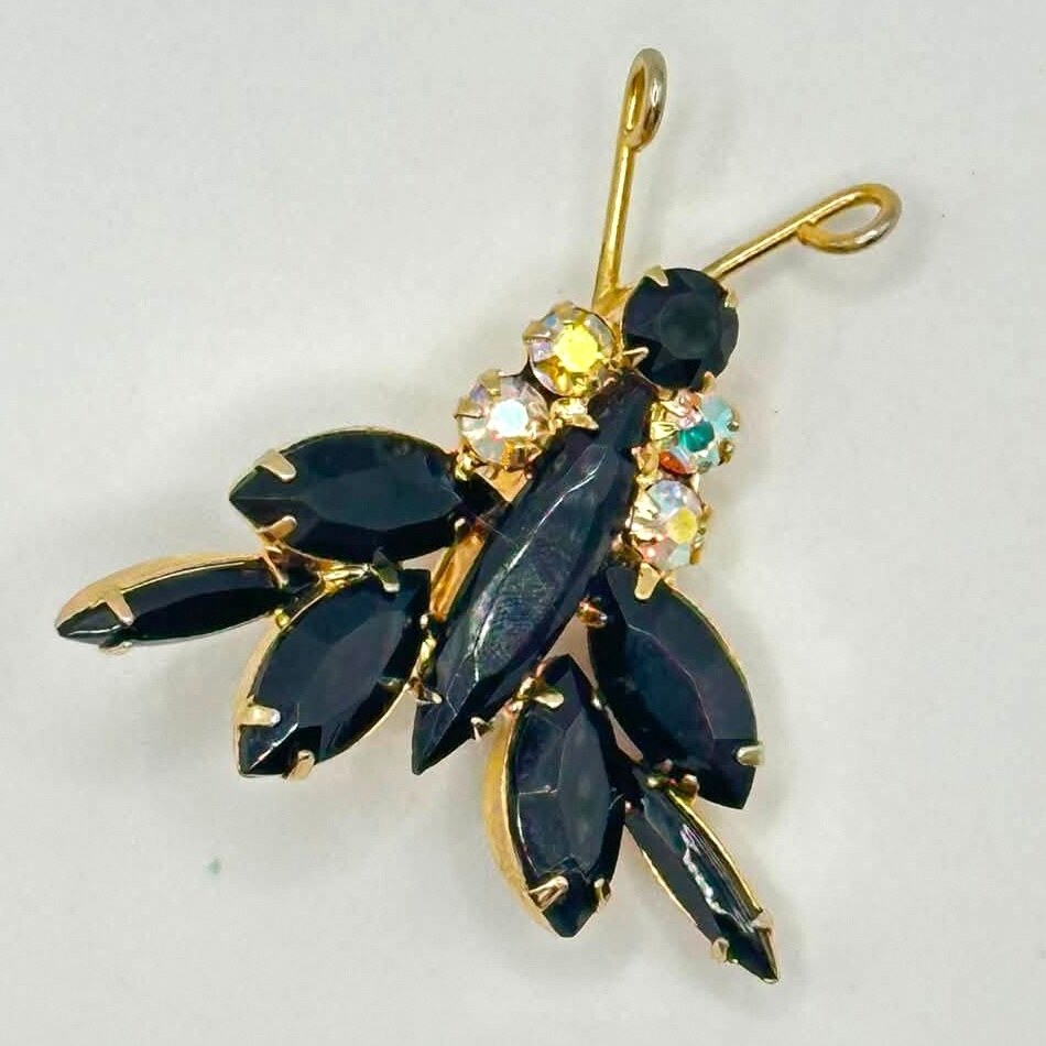 Front view of Black (jet) Navettes Brooch