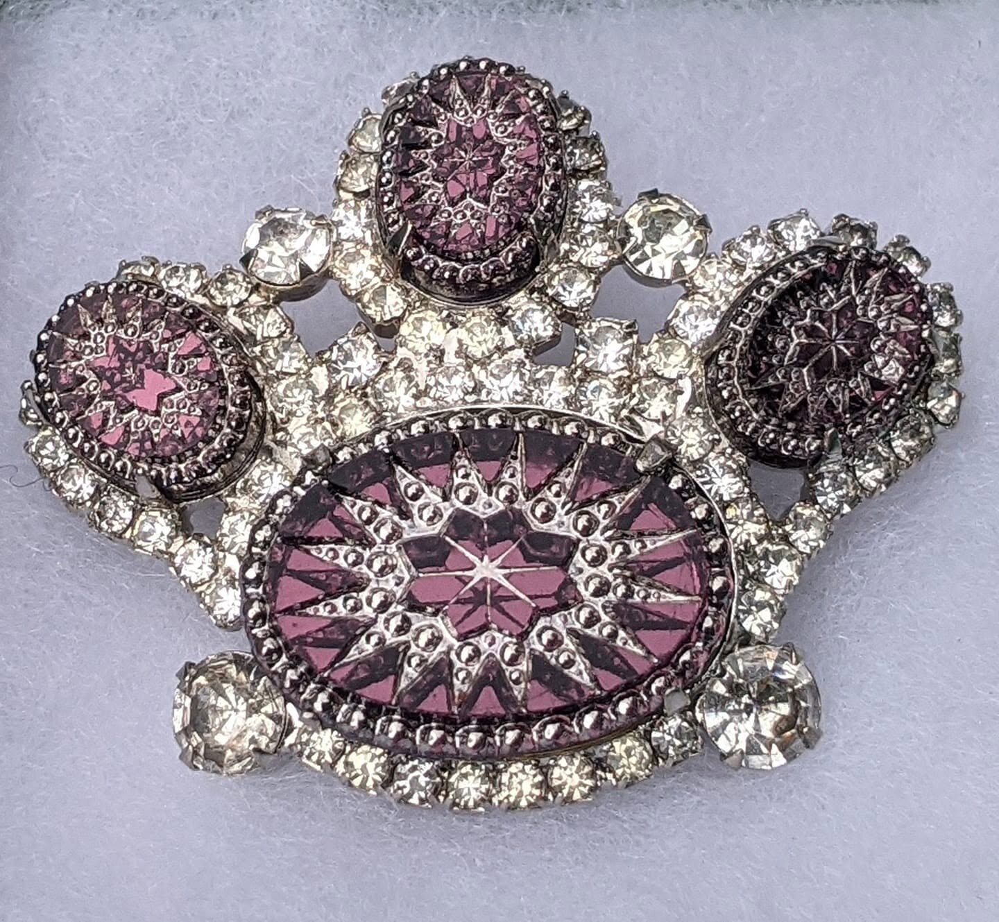 Front view of Purple (cardinal) Oval Molded/Cut Brooch