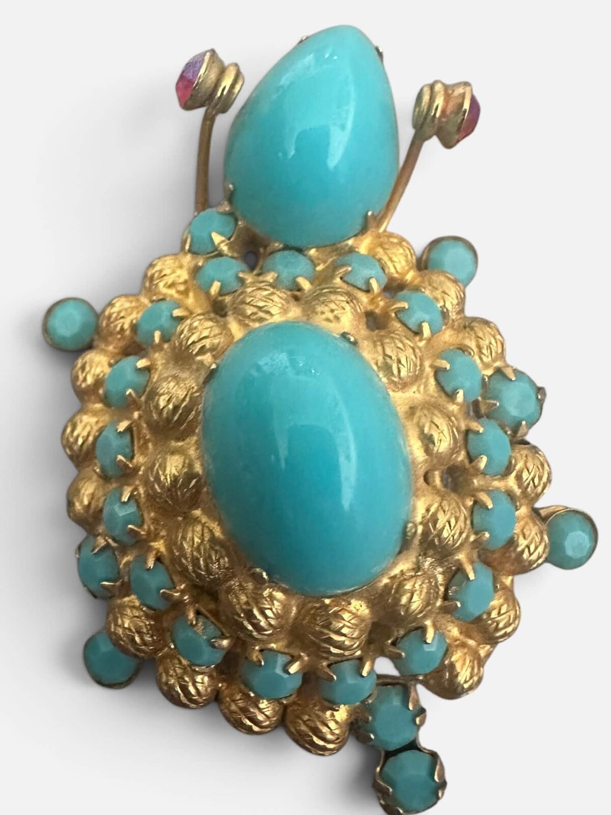 Front view of Turquoise Cabochons Brooch
