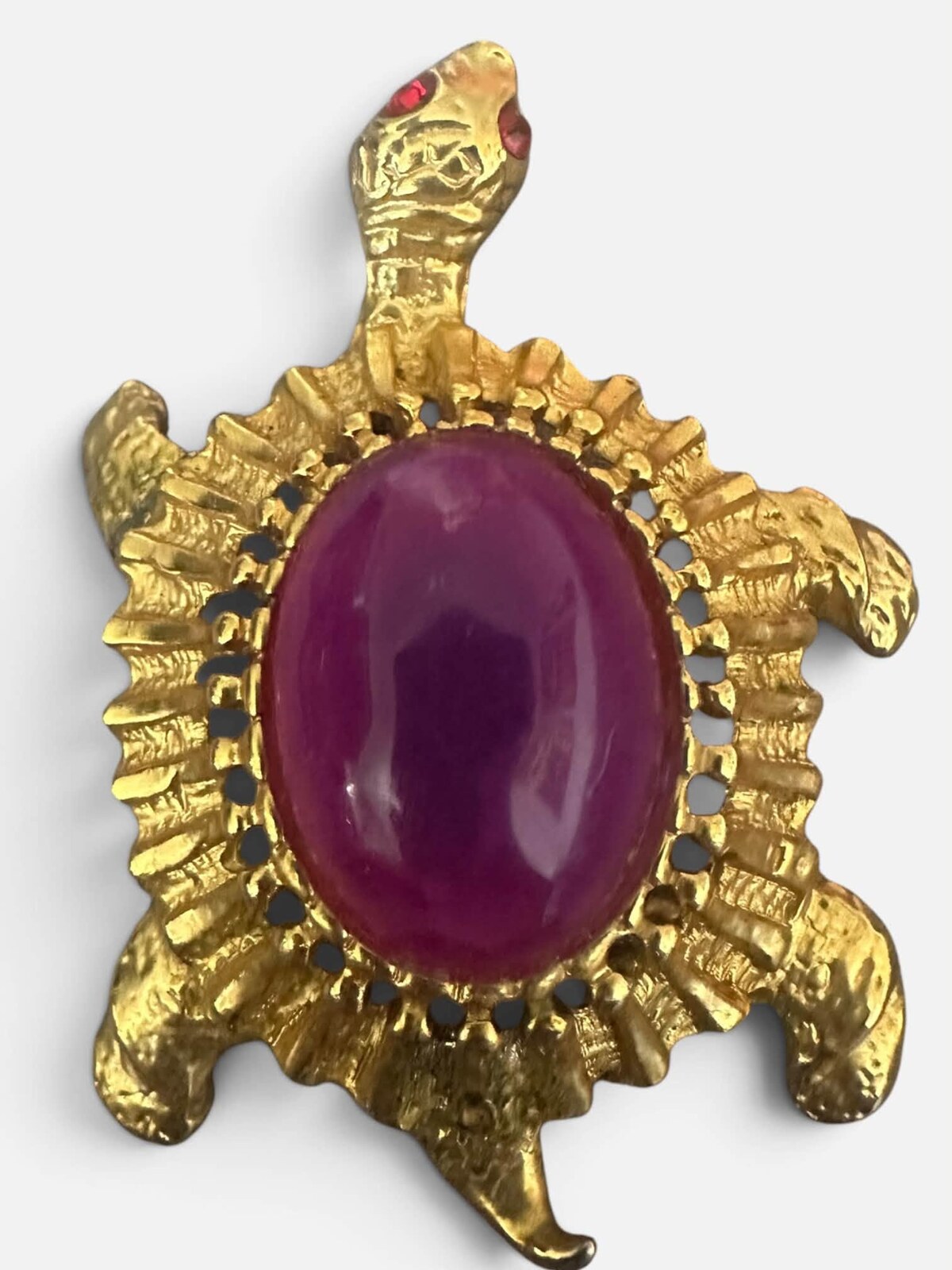 Front view of Purple (cardinal) Cabochons Brooch