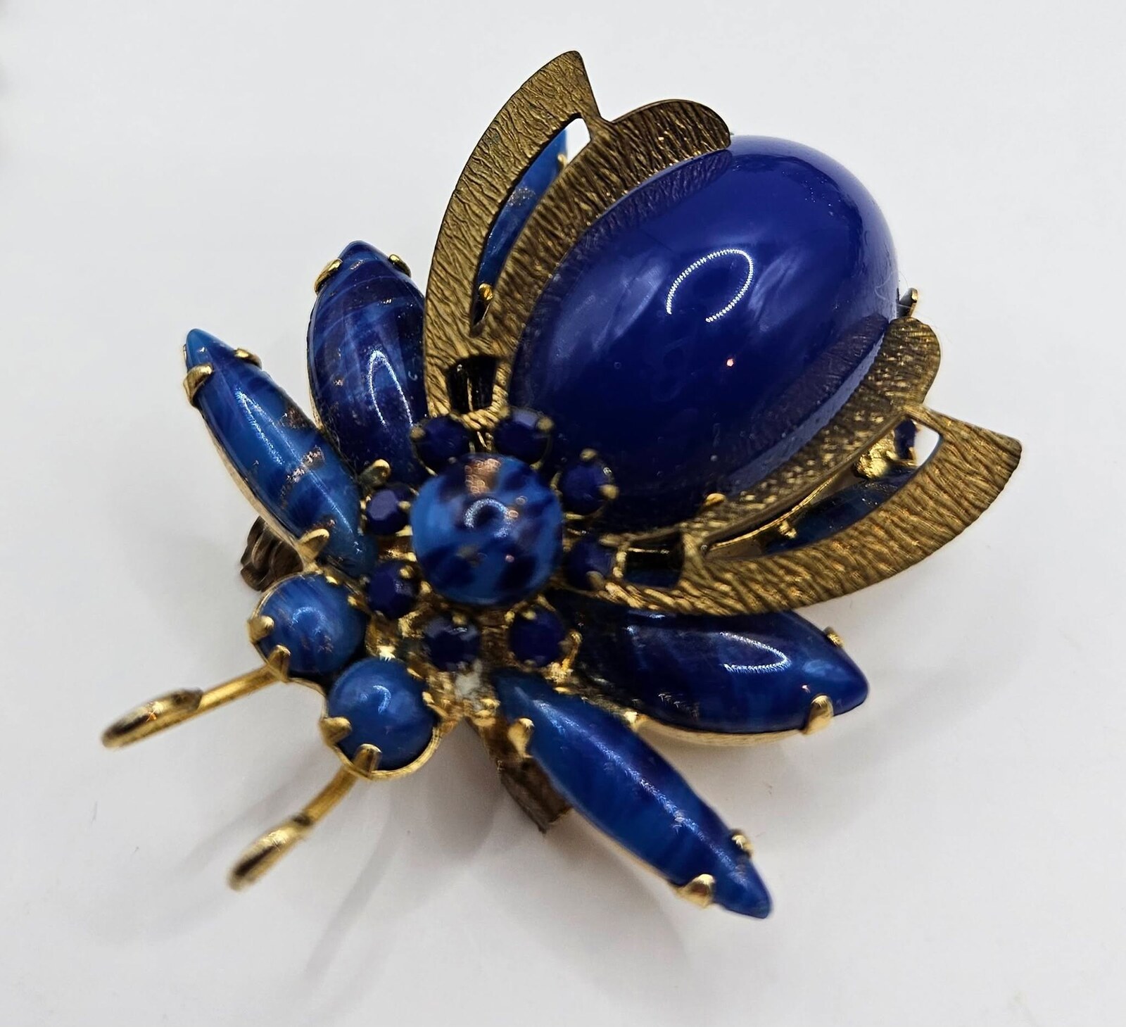 Front view of Blue Cabochons Striped Brooch