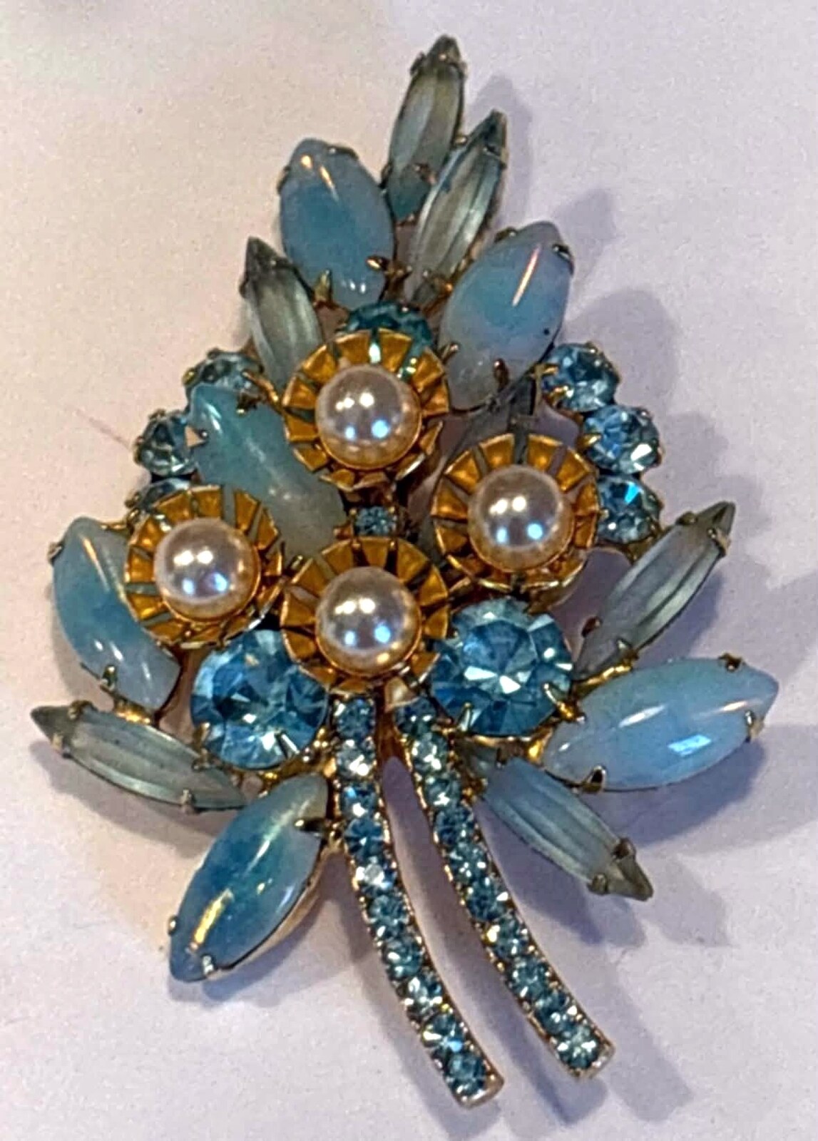 Front view of Blue Cabochons Pearl Brooch